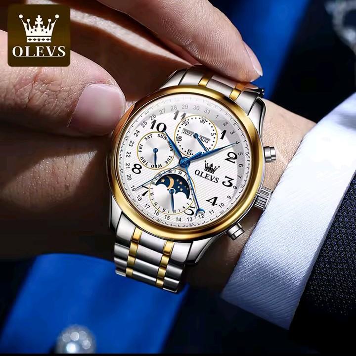 OLEVS two-tone watch worn on the wrist